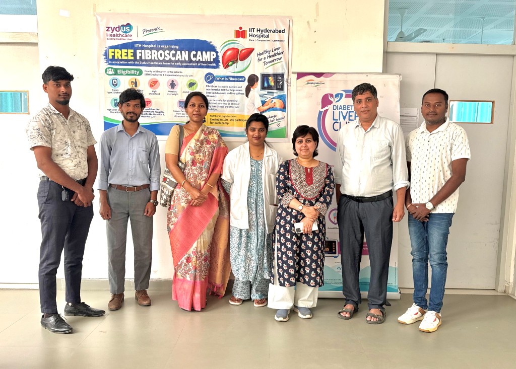 Hospital team with community members at the FibroScan camp