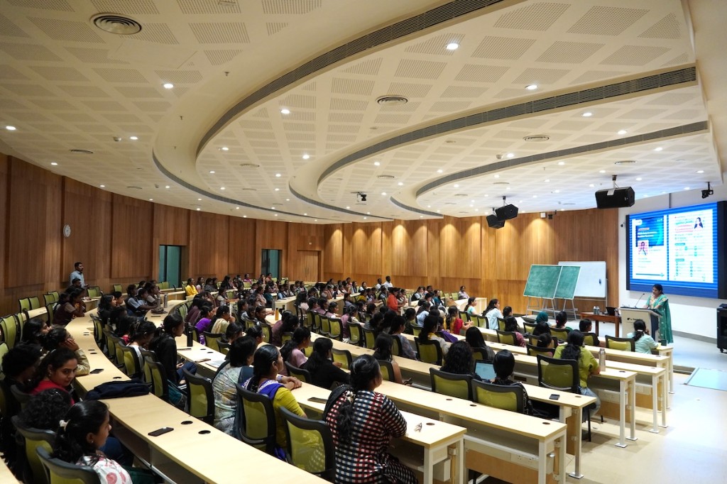 Students and staff in the lecture hall during the wellness session